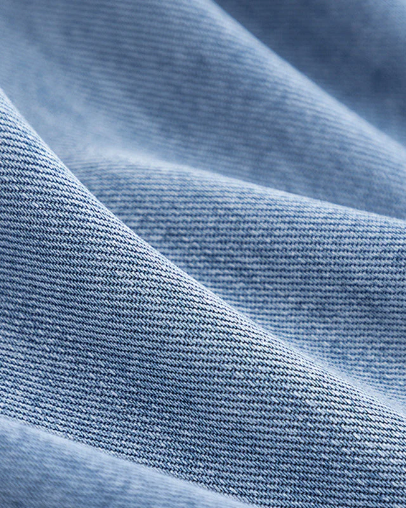 Sara - Denim en camelkleurige jas