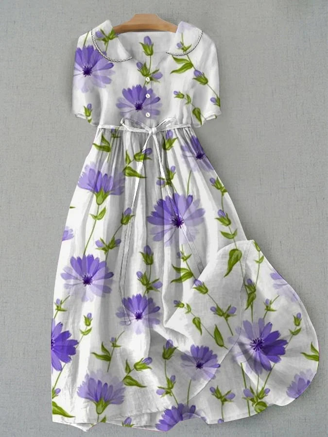 Jasmijn - Vintage bloemenjurk met tailleband en halve mouwen